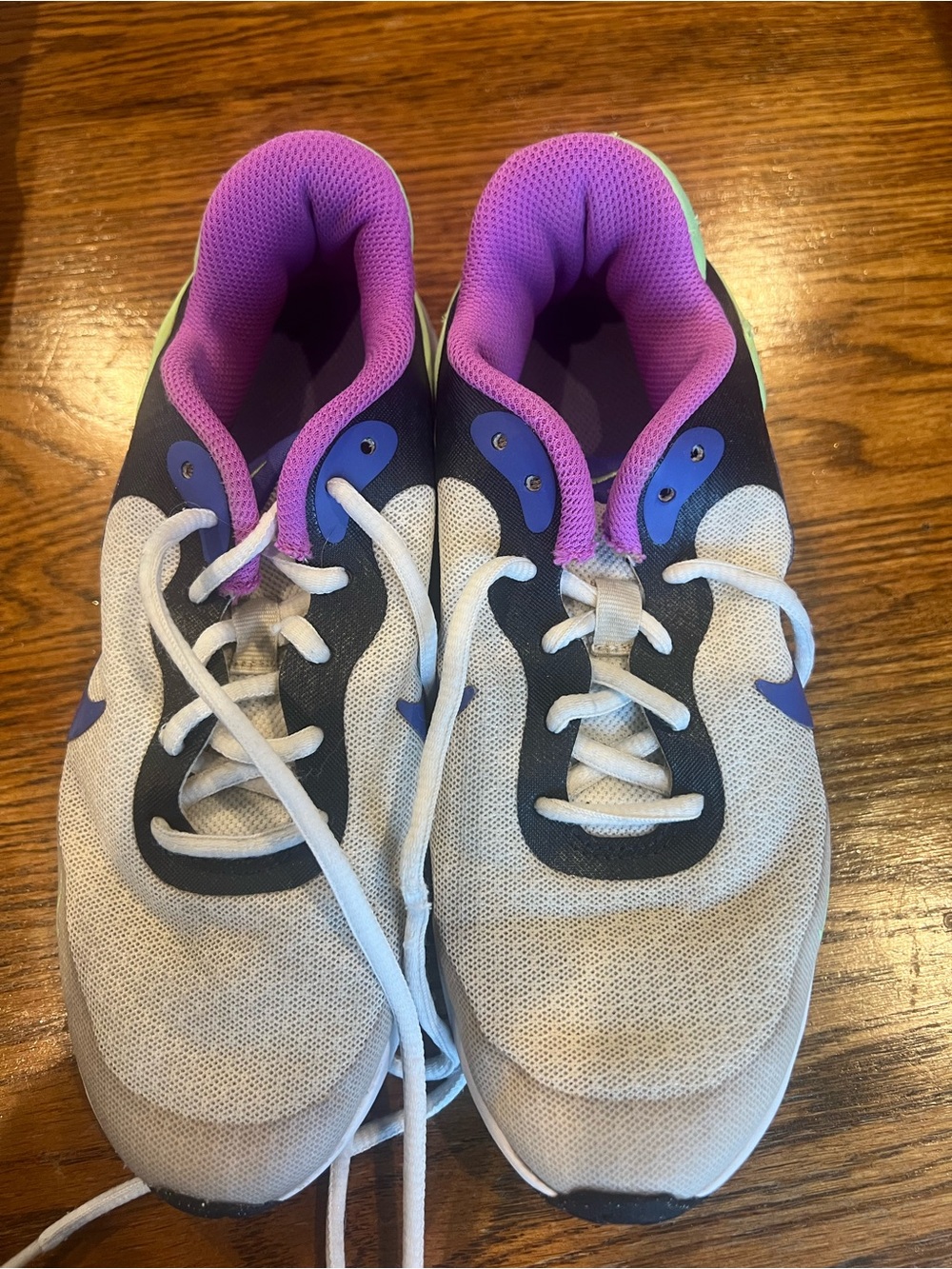 Nike Kids White Sneakers with Purple Lining and Blue Accents